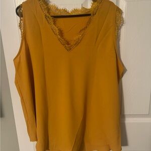 Light weight blouse. Great for under a suit jacket. Yellow.